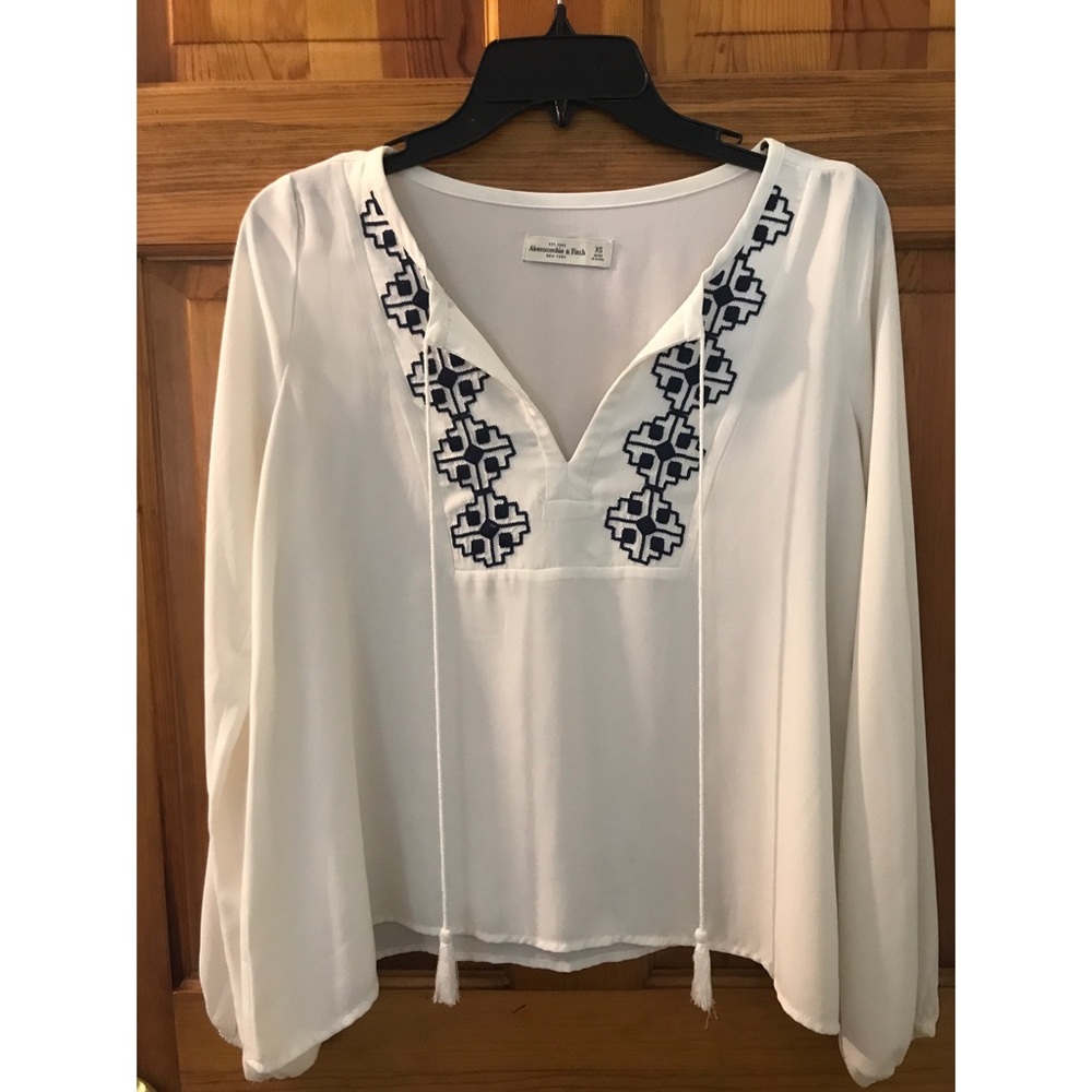 White & navy blouse